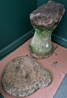 Lot 856 - A garden standing stone with shaped removable...