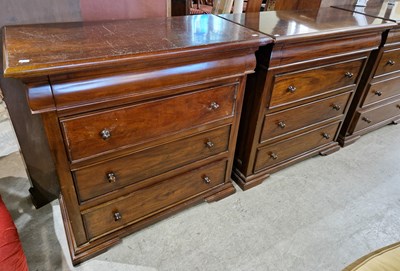 Lot 860 - A pair of Baker Furniture tall four drawer...