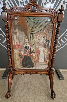 Lot 873 - A 19th century rosewood fire screen with...