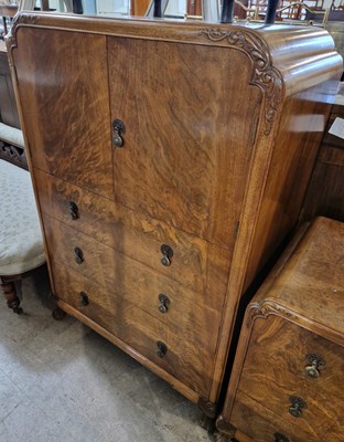 Lot 876 - A three-piece Art Deco walnut bedroom suite,...