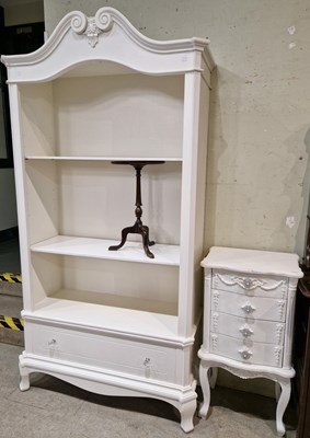 Lot 880 - A modern white painted French open armoire,...