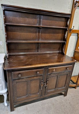 Lot 882 - An elm wood dresser, the upper section with...