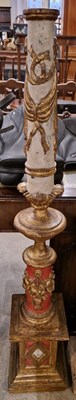 Lot 894 - A decorative carved wooden candle holder...