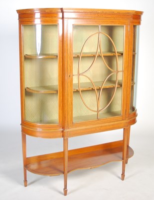 Lot 54 - An Edwardian satinwood display cabinet, the...