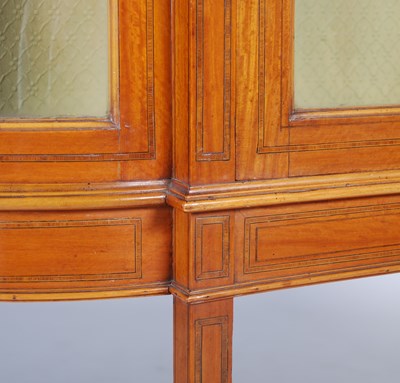 Lot 54 - An Edwardian satinwood display cabinet, the...