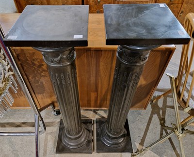 Lot 901 - A pair of black composite Doric columns, 103cm...