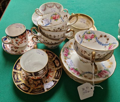 Lot 517A - A collection of tea cups and saucers to...