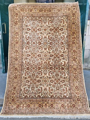 Lot 925 - A near pair of 20th century Persian beige...