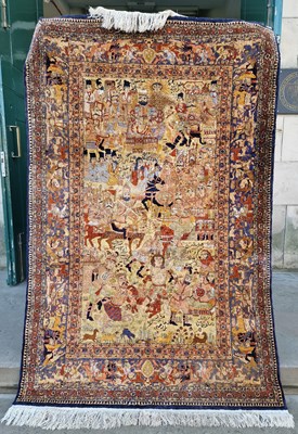 Lot 927 - A 20th century Persian silk rug, the...