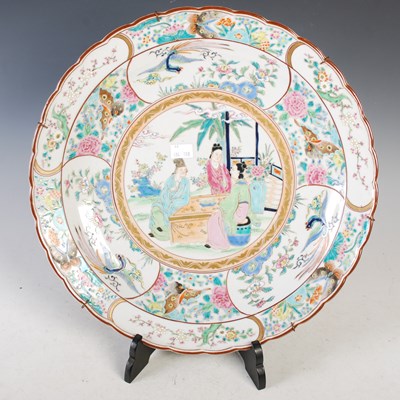 Lot 555 - A Chinese porcelain famille rose charger, 20th...