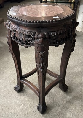 Lot 915A - A Chinese darkwood urn stand, Qing Dynasty, 60....