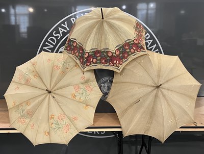 Lot 670 - Three assorted vintage parasols / umbrellas,...