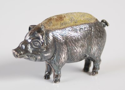 Lot 417 - An Edwardian silver pin cushion modelled as a...