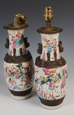 Lot 570 - A pair of Chinese porcelain famille rose...