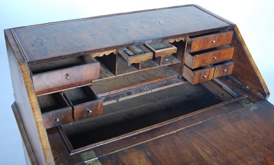 Lot 39 - A George II walnut bureau, the rectangular...