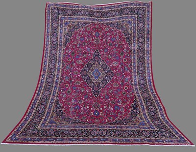 Lot 147 - A Persian Mashad carpet, 20th century, the...