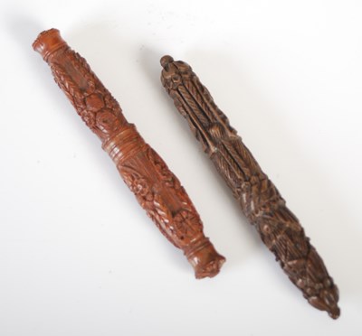 Lot 164 - Two 19th century carved coquilla nut two-part...