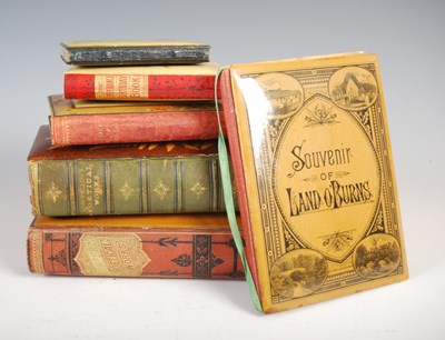Lot 167 - A collection of six Mauchline Ware bound books,...