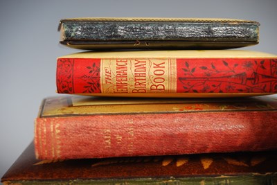 Lot 167 - A collection of six Mauchline Ware bound books,...