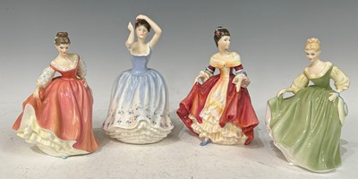 Lot 419 - A group of four Royal Doulton lady figures...