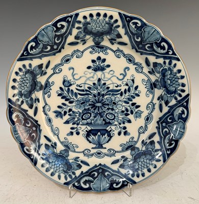 Lot 428 - Delft floral pattern blue and white wall dish,...