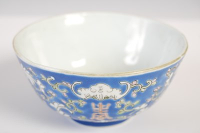 Lot 567 - A Chinese porcelain blue ground footed bowl,...