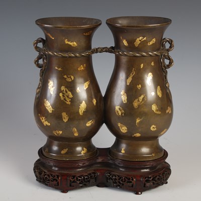 Lot 597 - A Chinese gold-splashed bronze double vase,...