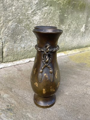 Lot 597 - A Chinese gold-splashed bronze double vase,...