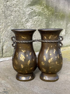 Lot 597 - A Chinese gold-splashed bronze double vase,...