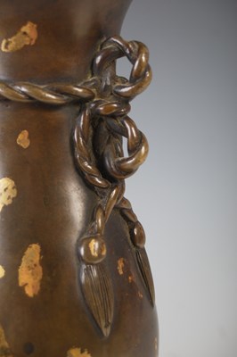 Lot 597 - A Chinese gold-splashed bronze double vase,...