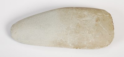 Lot 128 - A Neolithic polished stone hand axe, 11.5cm long.