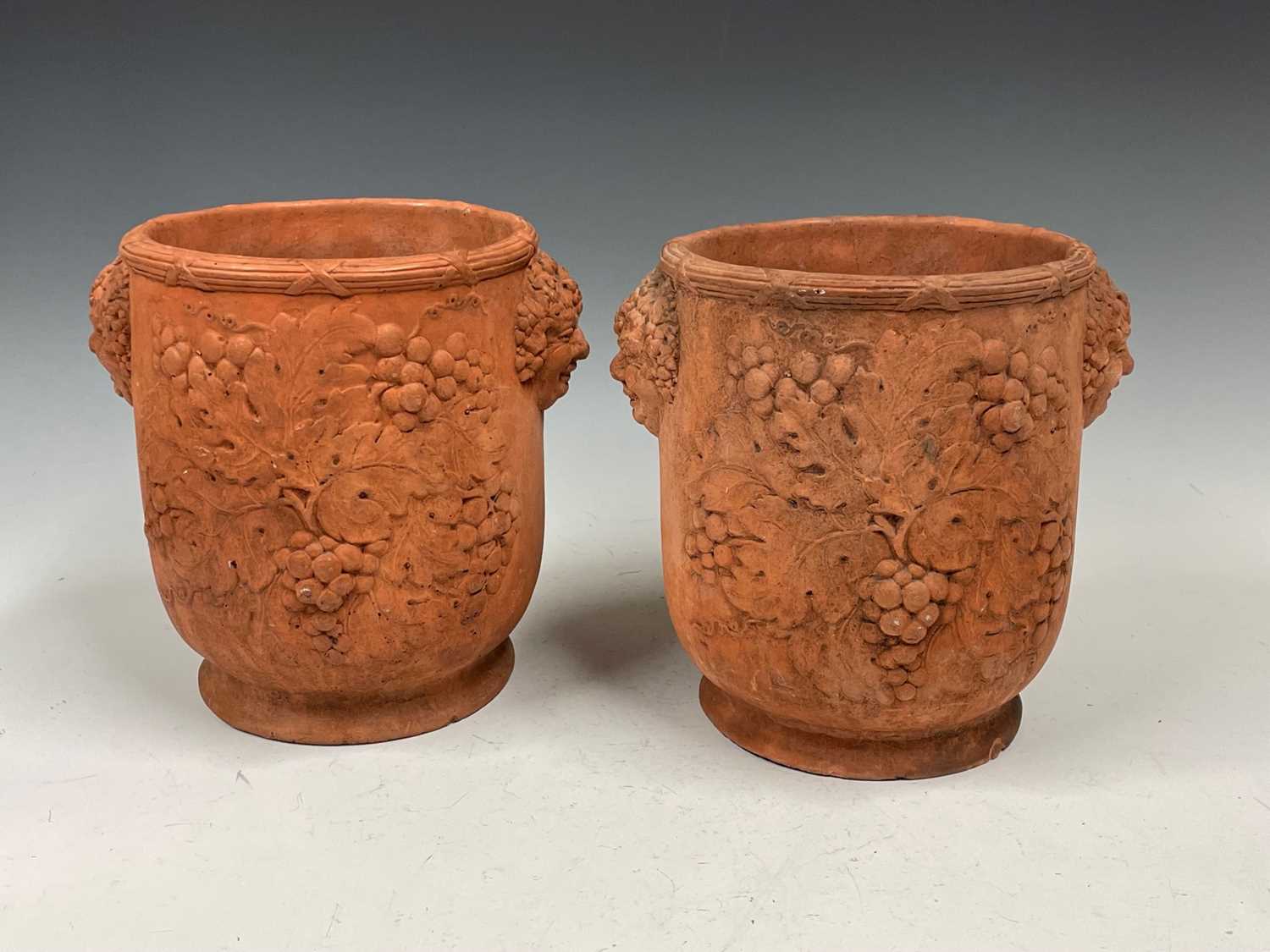 Lot 129 - A pair of terracotta wine coolers with...