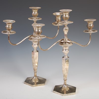 Lot 435 - A pair of Edwardian silver three-light...