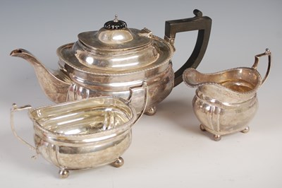 Lot 434 - A George V silver three-piece tea set, London,...