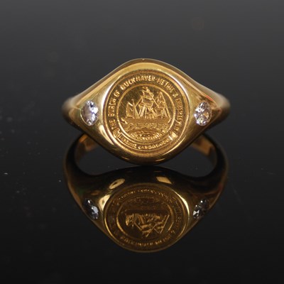 Lot 516 - An 18ct gold and diamond signet ring, the...