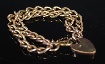 Lot 476 - A 9ct gold double chain bracelet, with...