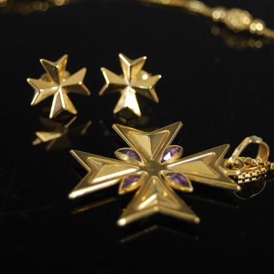 Lot 500 - A 9ct gold and amethyst Maltese cross pendant...