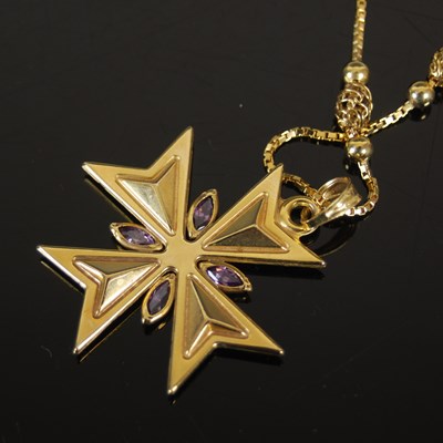 Lot 500 - A 9ct gold and amethyst Maltese cross pendant...