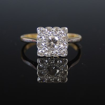 Lot 507 - A yellow and white metal diamond cluster ring,...