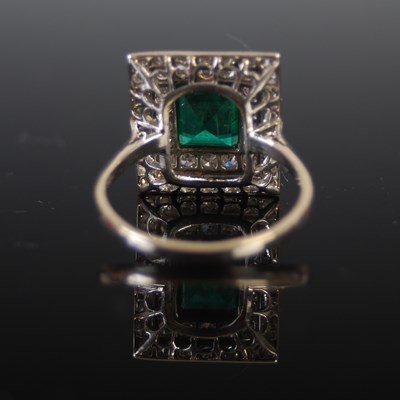 Lot 525 - A mid 20th century white metal, emerald and...