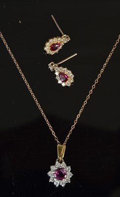 Lot 518 - A white and yellow metal, ruby and diamond...