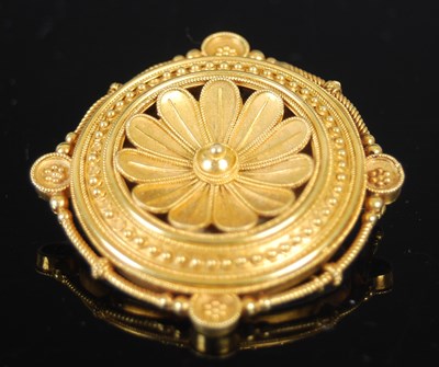 Lot 510 - A late 19th century yellow metal locket brooch,...