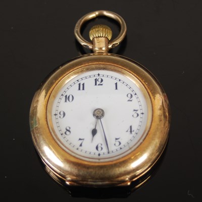 Lot 446 - A 15ct gold fob watch, the black and white...