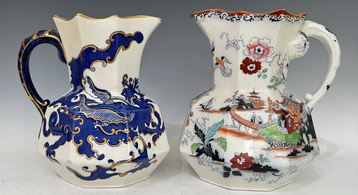 Lot 487 - Two antique Masons ironstone china hydra jugs...
