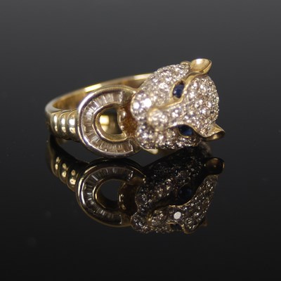 Lot 494 - A 9ct gold gem set panther ring, size 'M',...