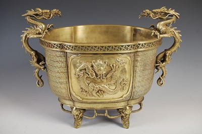 Lot 593 - A Chinese gilt bronze quatrefoil shaped dragon...