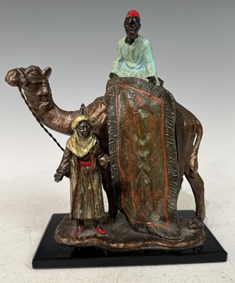 Lot 11 - A cold painted spelter figure group of two...