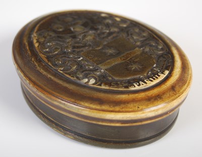 Lot 297 - A Queen Anne pressed horn oval snuff box, the...