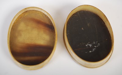 Lot 268 - A pressed horn oval snuff box, the pull-off...