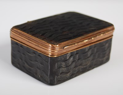 Lot 269 - A tortoiseshell oblong snuff box with overall...